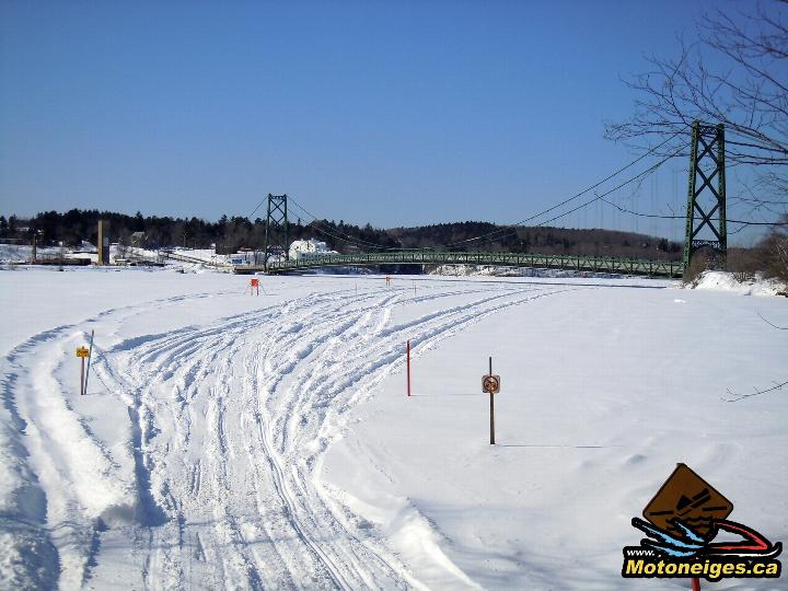 Trail M3 on St. Maurice River near Grand-Mère power plant, properly checked, signed and marked by the Club de Motos Neige de la Mauricie.